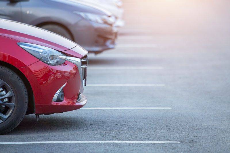 cars-parked-parking-lot-close-up-cars-sale-stock-lot-row-car-dealer-inventory